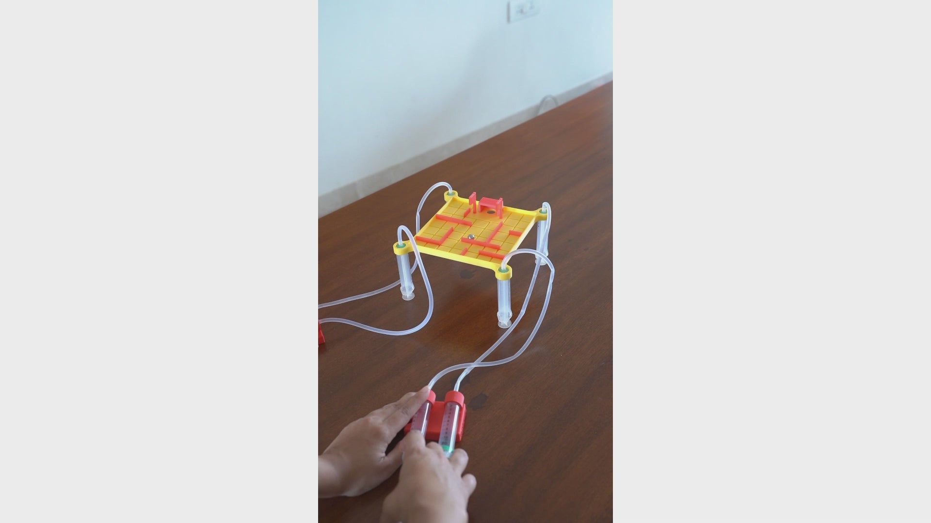 Demo video of a child performing a hands-on STEM learning activity using a DIY kit – Tinkernauts