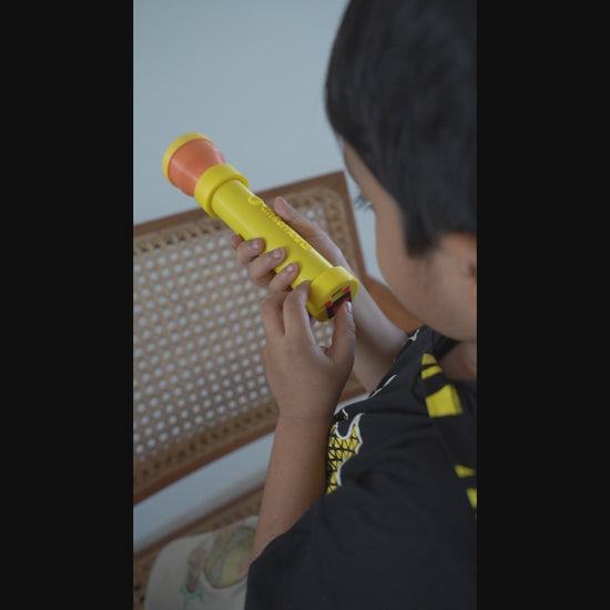 Video showing a child performing a hands-on STEM science experiment using a DIY kit – Tinkernauts