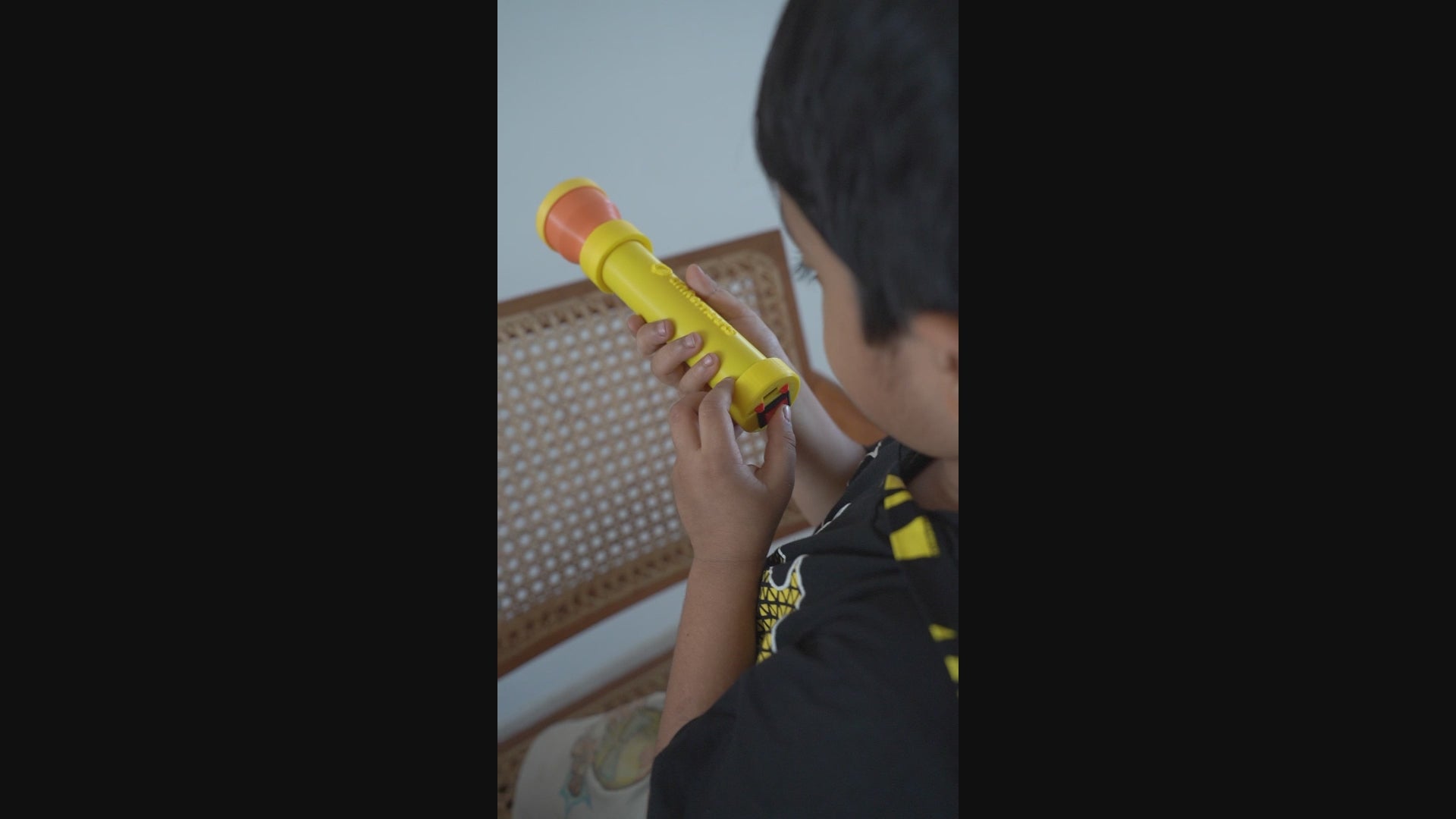 Video showing a child performing a hands-on STEM science experiment using a DIY kit – Tinkernauts