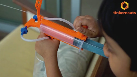 Demo video of a child assembling and testing a STEM engineering DIY kit for hands-on learning – Tinkernauts